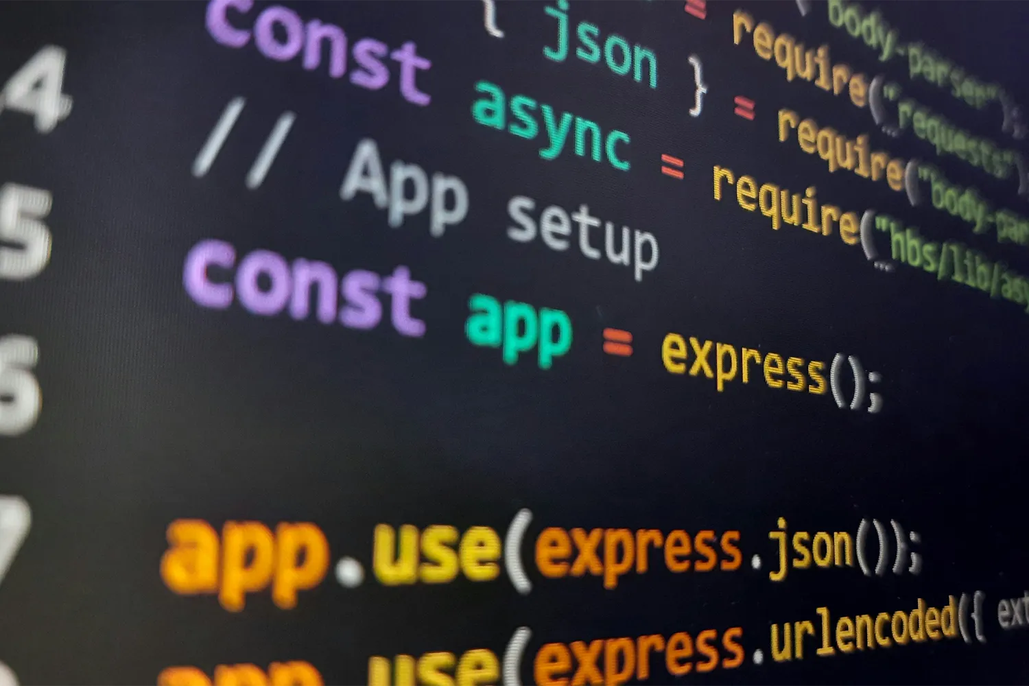 L'écran affiche du code JavaScript avec des termes colorés comme "const", "app", et "express" en surbrillance sur fond noir.