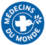 Logo bleu de Médecins du Monde avec une colombe blanche tenant un rameau d'olivier, entouré d'un cercle de texte.